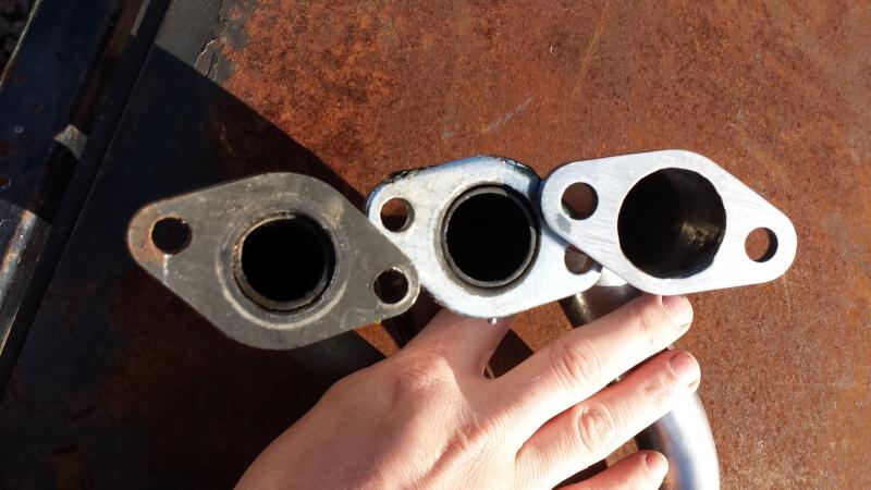 left stock exhaust port, middle is 1.0 in. od common performance exhaust port, right 1.25 in. od  custom big bore exhaust port